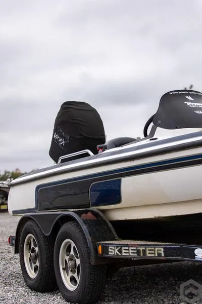 Slide: The Image of 2004 Skeeter ZX225 boat on a trailer, side view. - 1