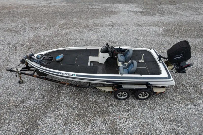 Slide: The Image of 2004 Skeeter ZX225 fishing boat on a dual-axle trailer, top view. - 3