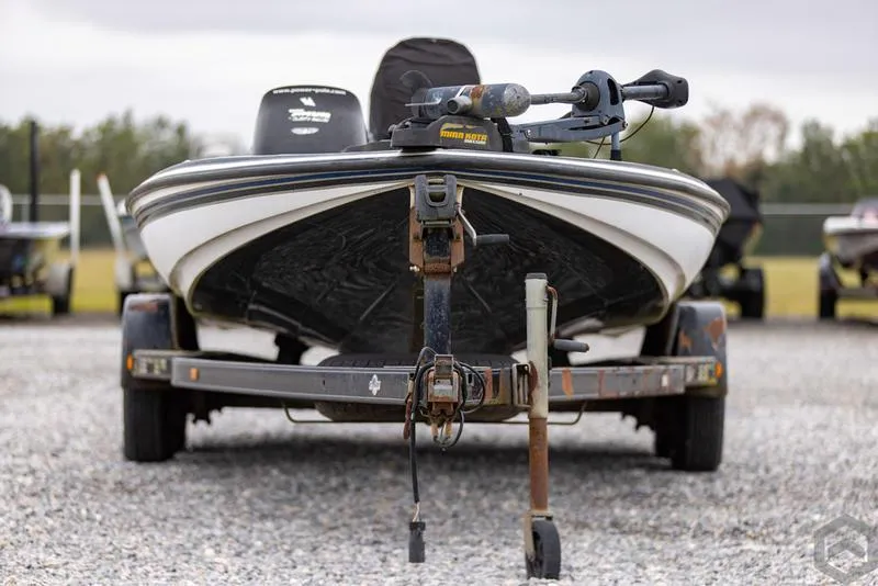 Slide: The Image of 2004 Skeeter ZX225 bass boat on a trailer, front view. - 9