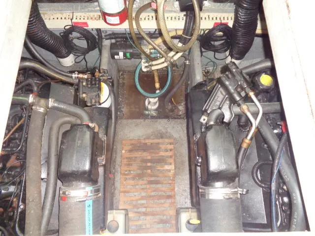 Slide: The Image of Engine room of a 1995 Sea Ray 400 Express Cruiser with twin engines. - 19