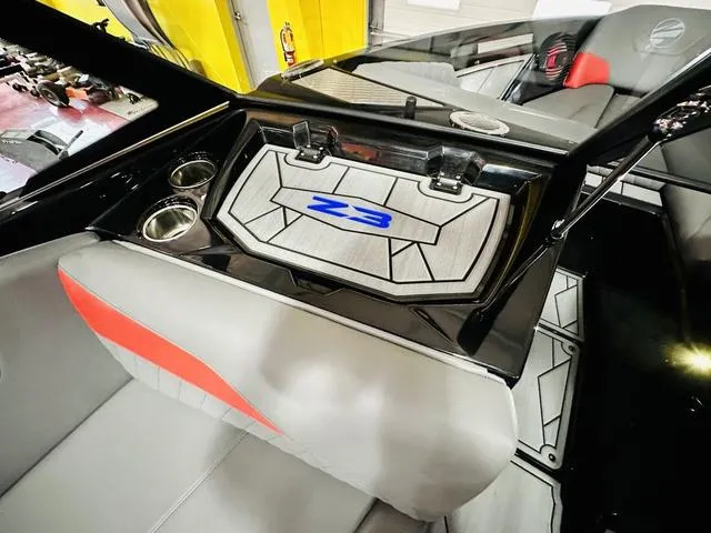 Slide: The Image of 2024 Tigé Z3 boat interior with stylish seating and cup holders. - 10