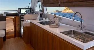 Slide: The Image of Interior of 2024 Solaris Power 48' Lobster yacht with modern kitchen and ocean view. - 4