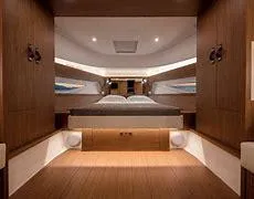 Slide: The Image of Luxurious interior cabin of 2024 Solaris Power 48' Lobster yacht with modern wood finish. - 6