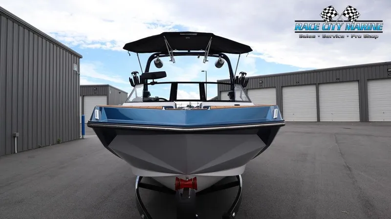 Slide: The Image of 2024 Nautique GS24 boat at Race City Marine dealership. - 2