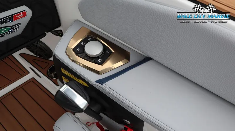 Slide: The Image of 2024 Nautique GS24 boat control panel with sleek design and advanced features. - 34
