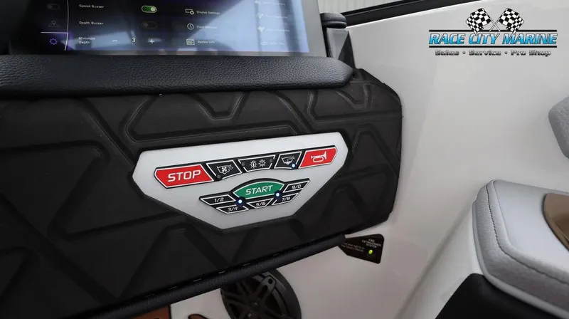 Slide: The Image of 2024 Nautique GS24 boat control panel with start/stop buttons and Race City Marine logo. - 42