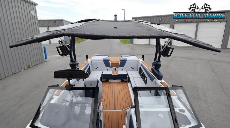 Slide: The Image of 2024 Nautique GS24 boat with canopy at Race City Marine. - 47