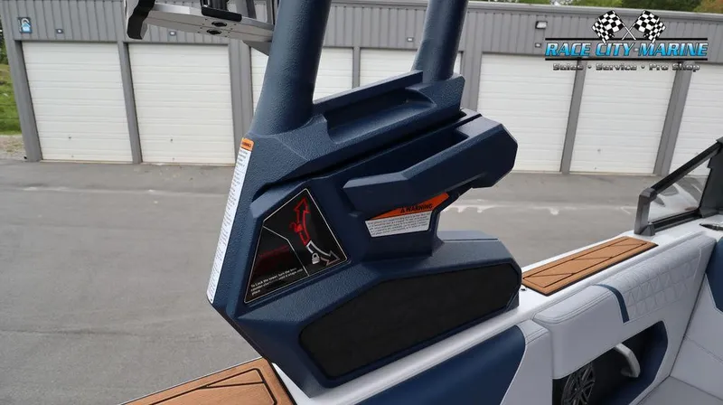 Slide: The Image of 2024 Nautique GS24 boat interior detail with Race City Marine logo. - 48