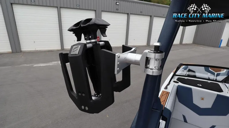 Slide: The Image of 2024 Nautique GS24 boat with a wakeboard rack at Race City Marine. - 49