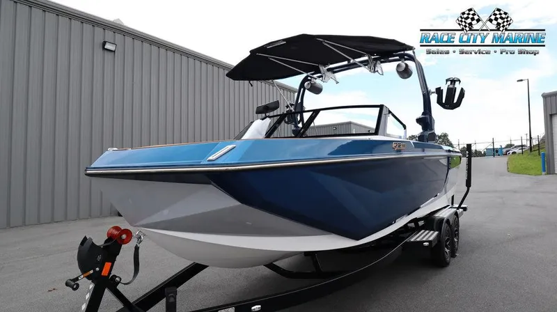 Slide: The Image of 2024 Nautique GS24 boat on trailer at Race City Marine. - 5