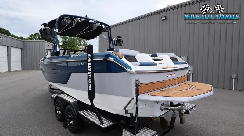 Slide: The Image of 2024 Nautique GS24 boat at Race City Marine dealership. - 6