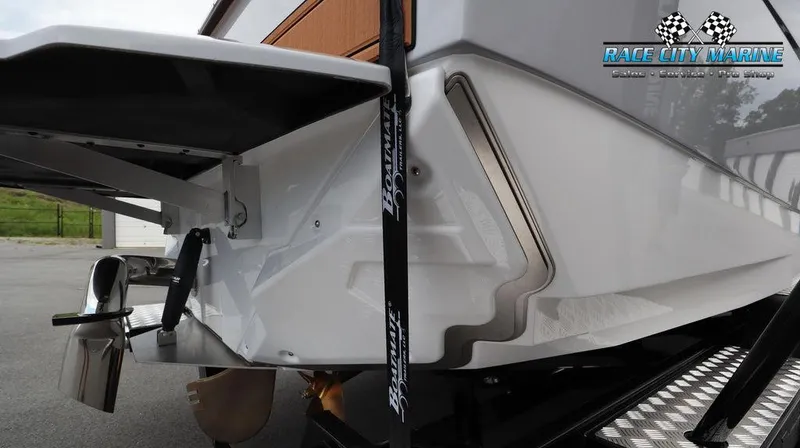 Slide: The Image of 2024 Nautique GS24 boat rear view at Race City Marine. - 8