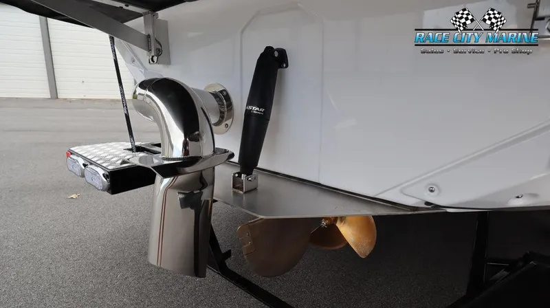 Slide: The Image of Close-up of the 2024 Nautique GS24 boat's propeller and exhaust system. - 9