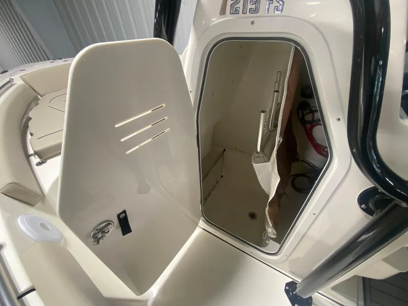 Slide: The Image of 2024 Key West 219 FS boat interior storage compartment. - 16