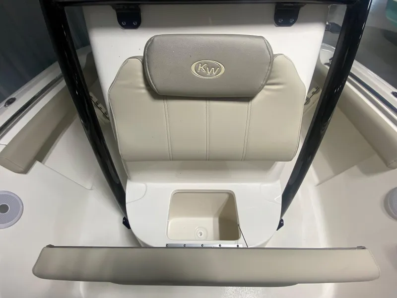 Slide: The Image of 2024 Key West 219 FS boat interior seating and storage compartment. - 18