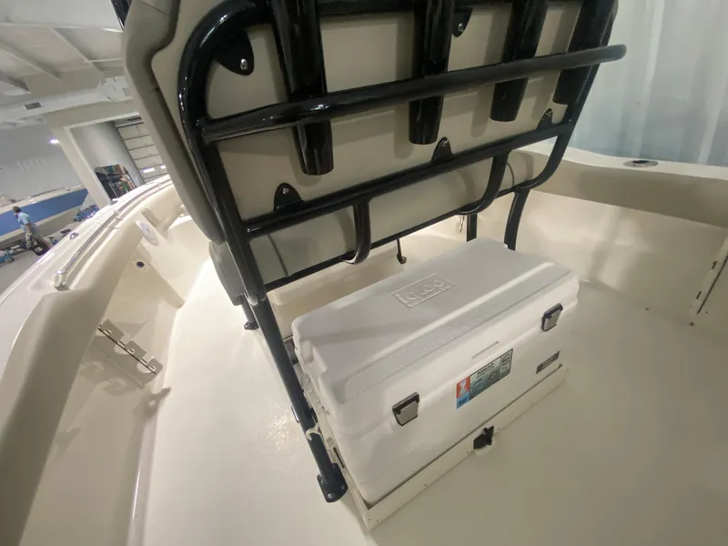 Slide: The Image of 2024 Key West 219 FS boat interior with cooler under seat. - 9