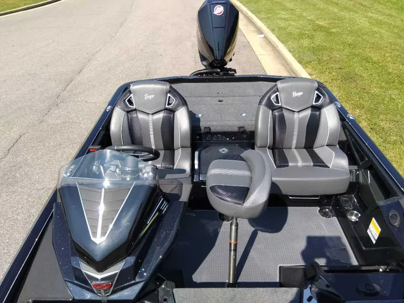 Slide: The Image of 2024 Ranger Z521R Ranger Cup Equipped boat interior with dual seats and steering console. - 4