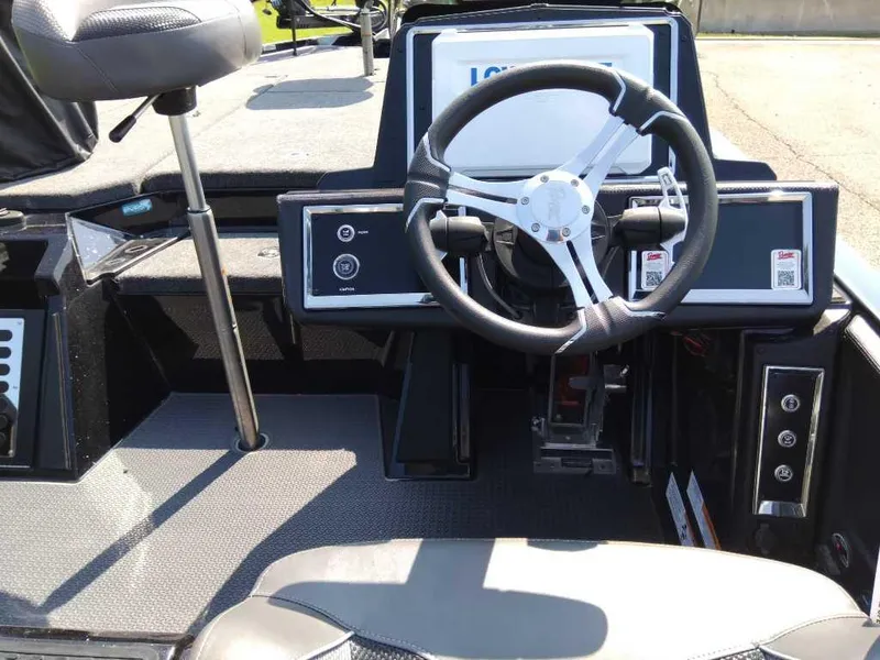 Slide: The Image of 2024 Ranger Z521R Ranger Cup Equipped boat cockpit with steering wheel and control panel. - 7