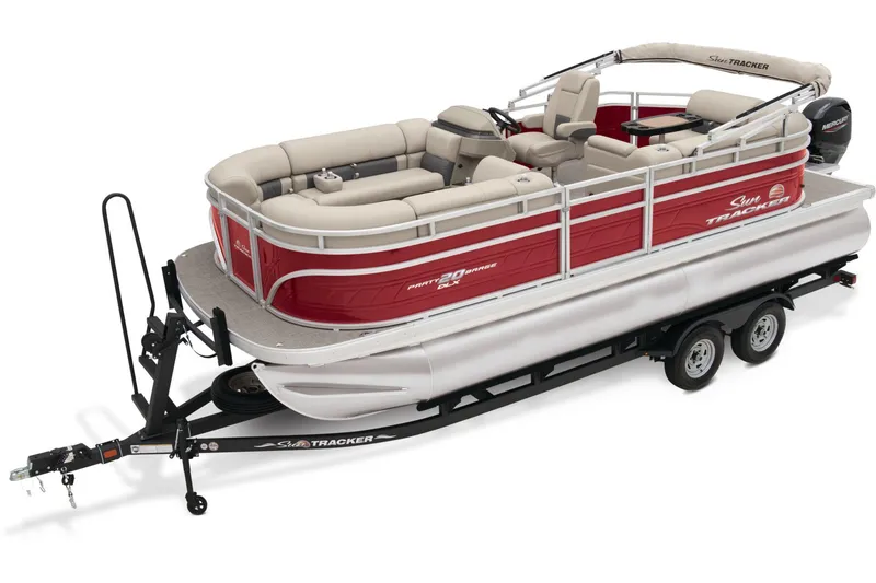 Slide: The Image of 2024 Sun Tracker Party Barge 20 DLX pontoon boat on trailer, red and beige upholstery. - 3