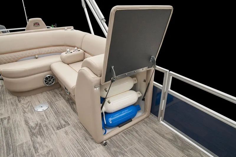 Slide: The Image of 2024 Ranger Reata 220F boat interior with storage compartment open. - 49