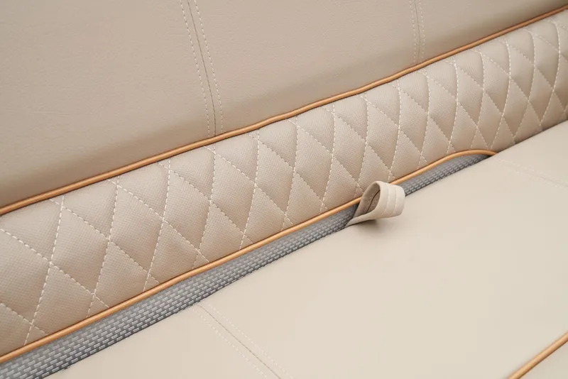 Slide: The Image of 2024 Ranger Reata 220F beige diamond-stitched leather seat detail. - 56