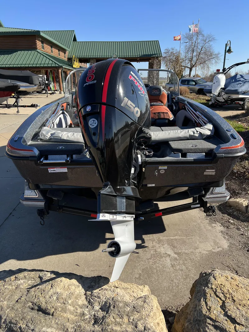 Slide: The Image of 2024 Ranger 1850MS boat with outboard motor, rear view. - 6