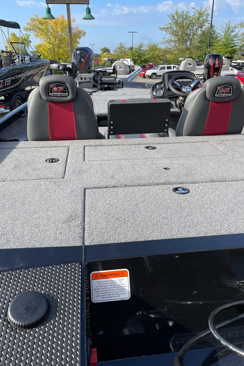 Slide: The Image of 2024 Ranger RT198P fishing boat with dual seats and spacious deck. - 3