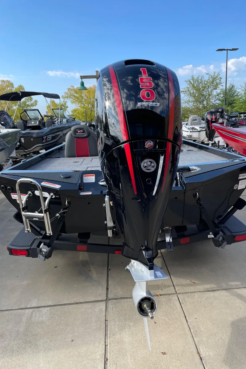 Slide: The Image of 2024 Ranger RT198P boat with a powerful 150 HP engine, rear view. - 5