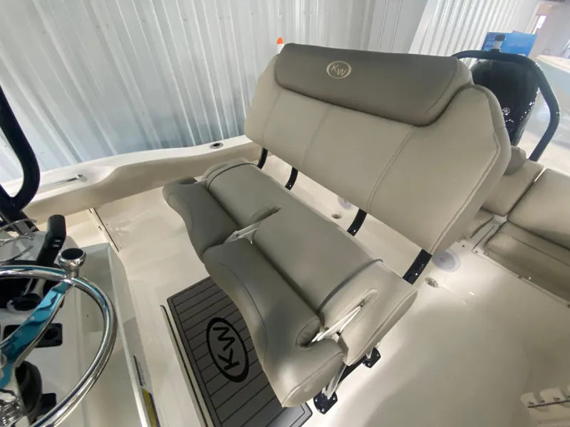 Slide: The Image of 2024 Key West 219 FS boat interior seating and helm. - 10