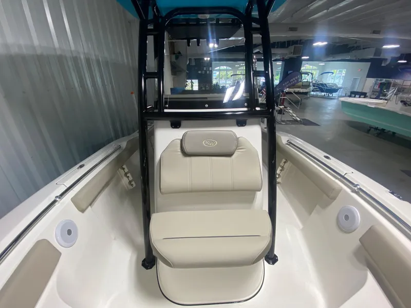 Slide: The Image of 2024 Key West 219 FS boat interior with seating and storage. - 17