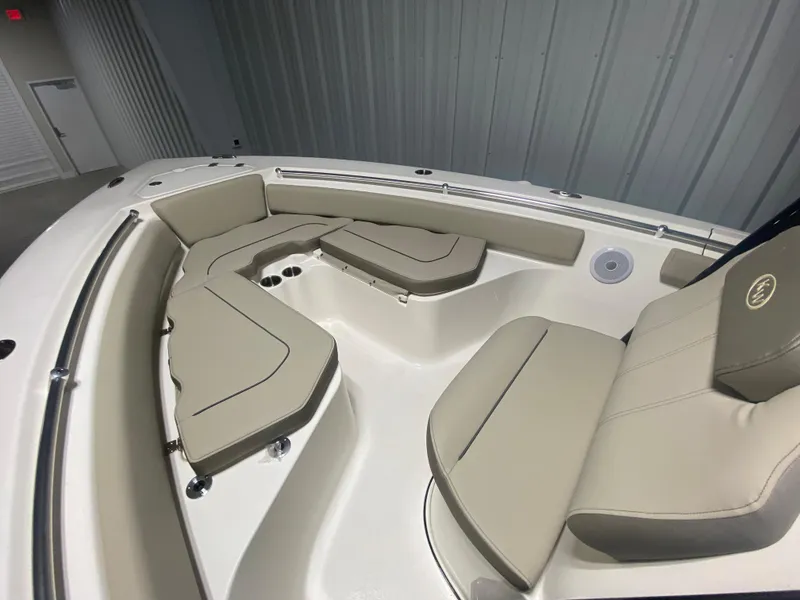 Slide: The Image of 2024 Key West 219 FS boat interior with cushioned seating. - 20
