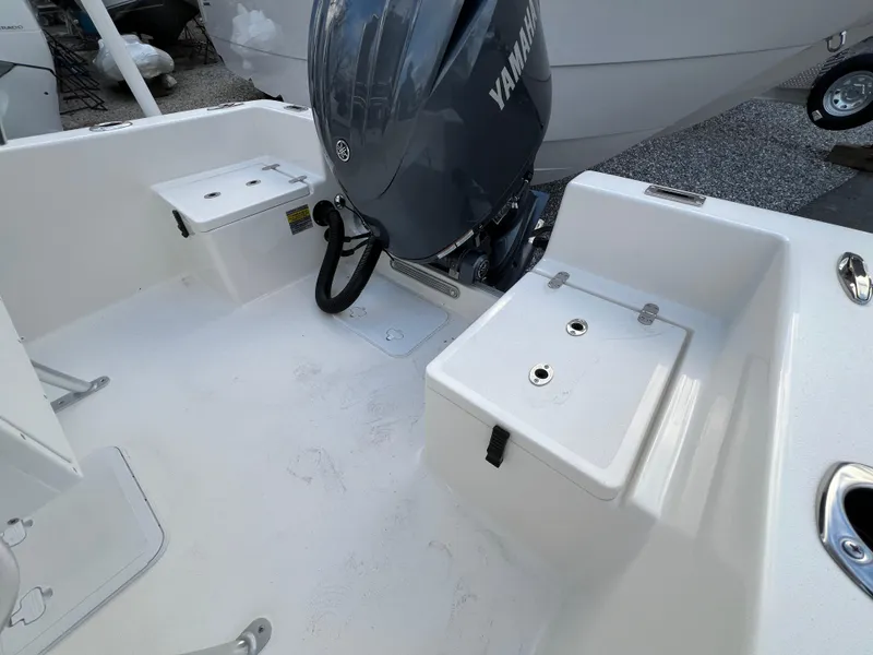 Slide: The Image of 2024 KenCraft 21 boat with Yamaha outboard motor, spacious deck layout. - 12
