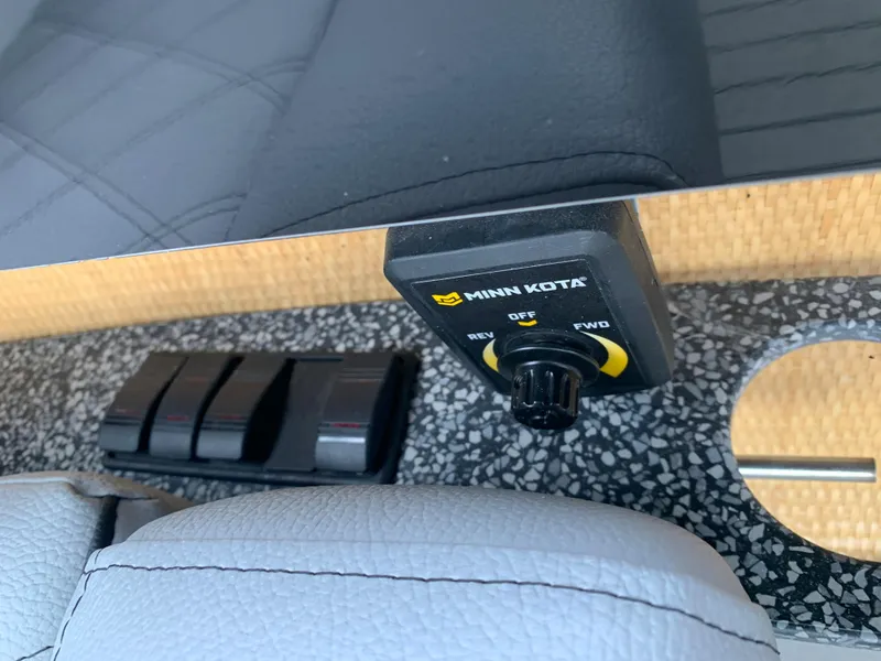 Slide: The Image of Minn Kota control panel on Vision Marine Technologies Quietude 156, 2021 model. - 10