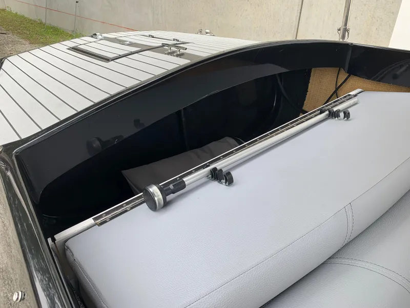 Slide: The Image of 2021 Vision Marine Technologies Quietude 156 boat interior with grey seating and sleek design. - 7