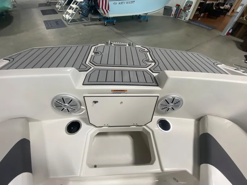 Slide: The Image of 2024 Starcraft SVX 171 boat interior with speakers and storage compartments. - 17