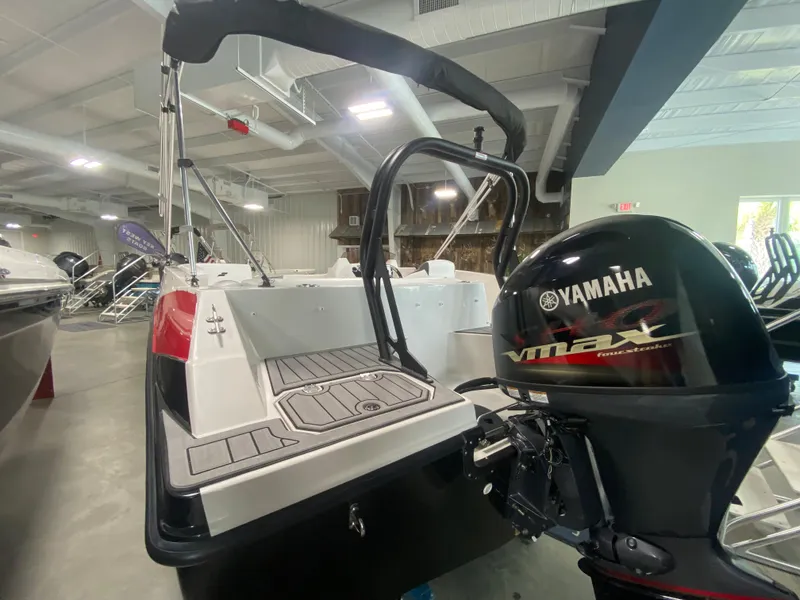 Slide: The Image of 2024 Starcraft SVX 171 boat with Yamaha VMAX outboard motor in showroom. - 3