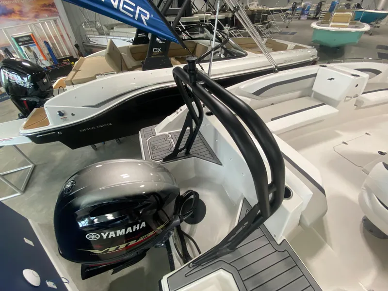 Slide: The Image of 2024 Starcraft SVX 171 boat with Yamaha outboard motor in showroom. - 4