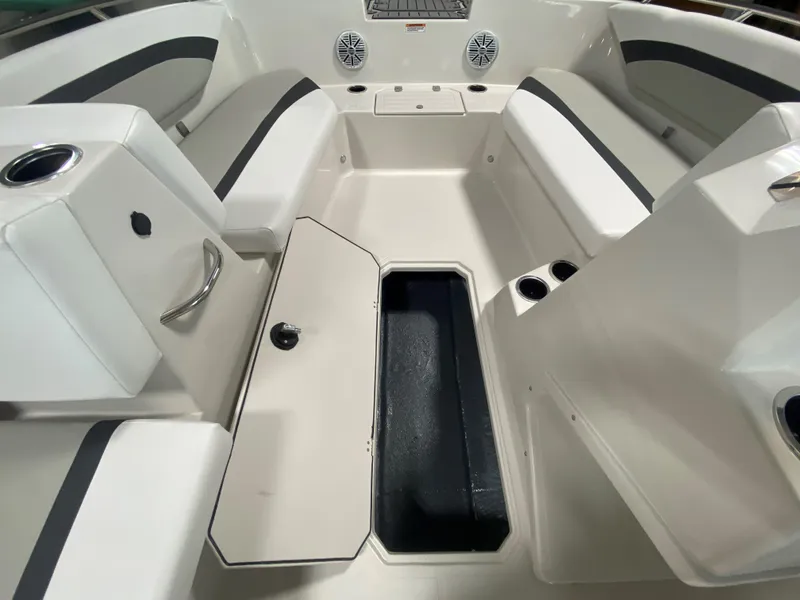 Slide: The Image of 2024 Starcraft SVX 171 boat interior with open storage compartment and seating. - 9