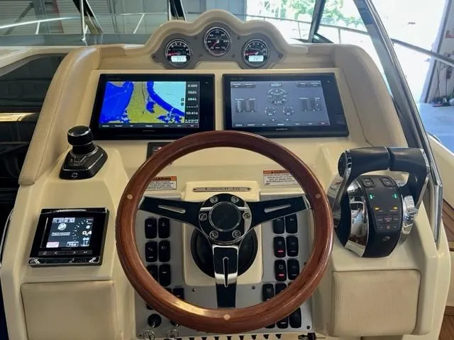 Slide: The Image of 2018 Chris-Craft Launch 38 helm with advanced navigation and control systems. - 10