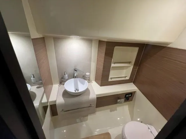 Slide: The Image of 2018 Chris-Craft Launch 38 bathroom with modern sink and toilet. - 18