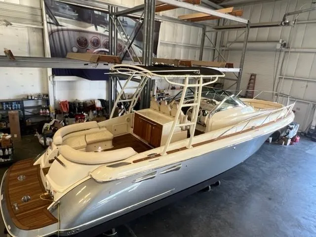 Slide: The Image of 2018 Chris-Craft Launch 38 in a storage facility, showcasing luxury interior and sleek design. - 5