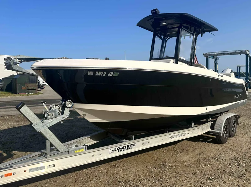 Slide: The Image of 2016 Robalo 2420 Center Console boat on Load Rite trailer. - 1