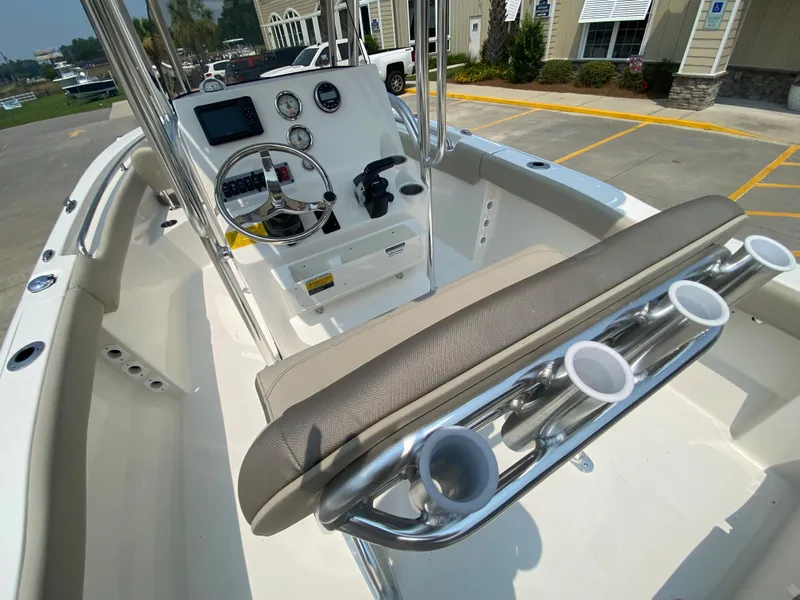 Slide: The Image of 2024 Key West 203 FS boat interior with console and seating. - 11