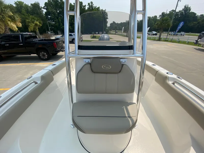 Slide: The Image of 2024 Key West 203 FS boat interior with seating and console. - 19