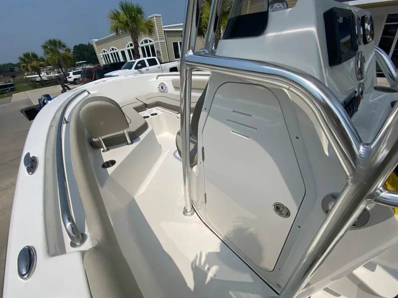Slide: The Image of 2024 Key West 203 FS boat interior with seating and console. - 16