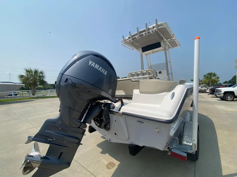 Slide: The Image of 2024 Key West 203 FS boat with Yamaha outboard motor, rear view. - 4