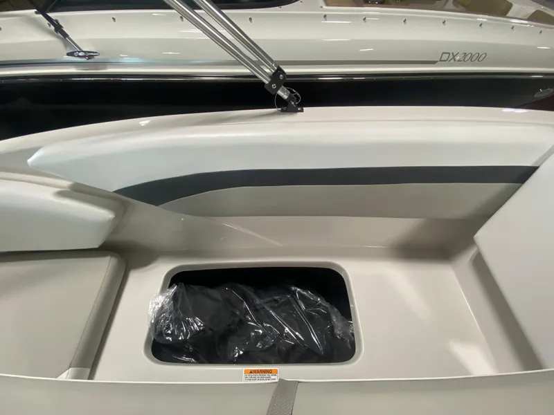 Slide: The Image of 2026 Starcraft SVX 171 boat interior storage compartment. - 12