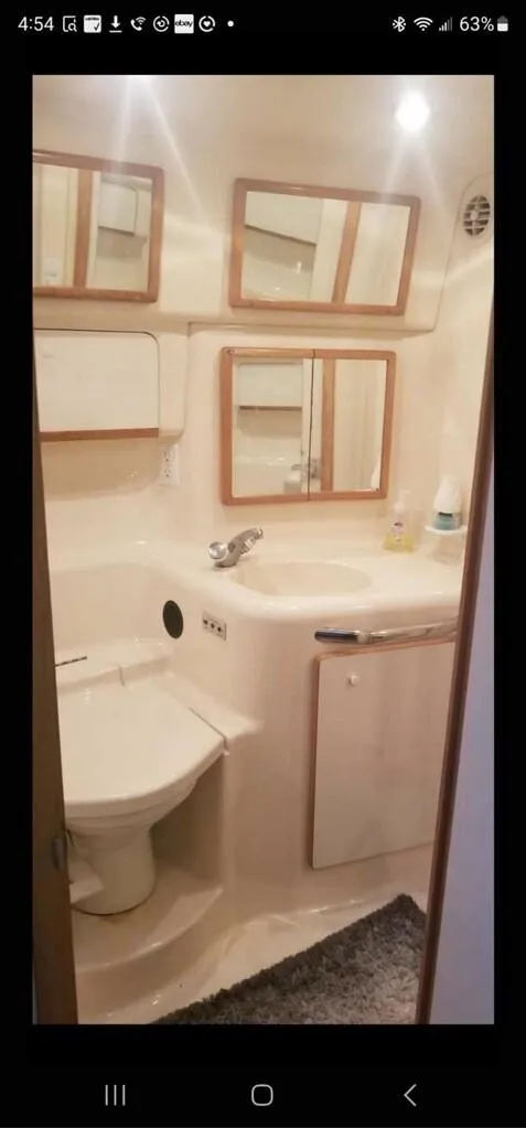 Slide: The Image of Bathroom interior of a 1995 Sea Ray 450 Sundancer yacht. - 2