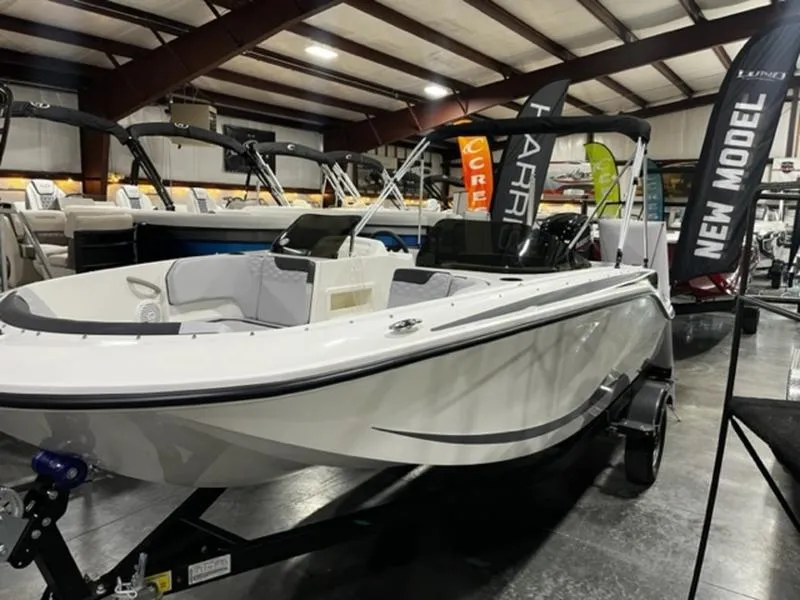 The Image of 2024 Bayliner Element M17 boat on display in a showroom. - 1