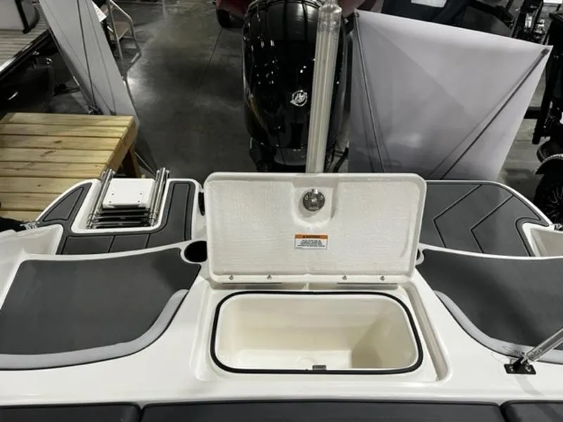 Slide: The Image of 2024 Bayliner Element M17 boat with open storage compartment and seating area. - 4
